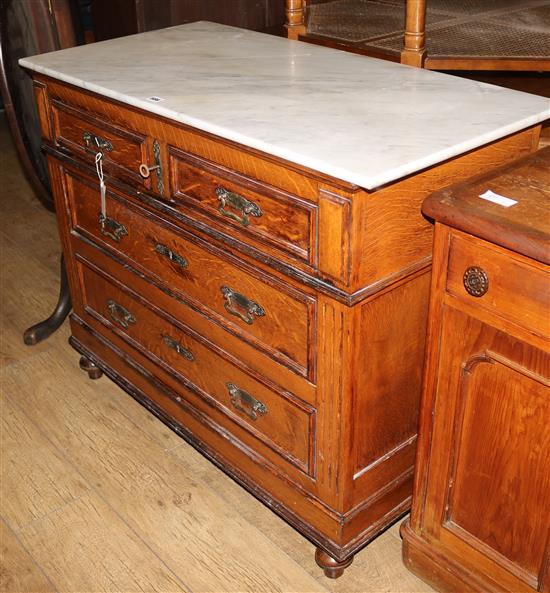 A French marble topped oak commode, c.1900, W.120cm